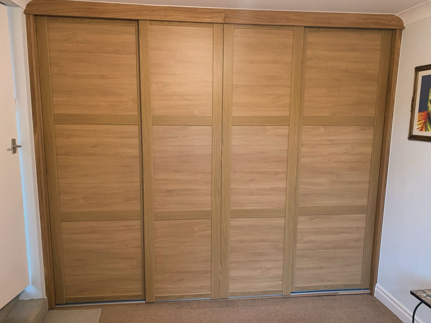 Oak four-panel sliding door wardrobe
